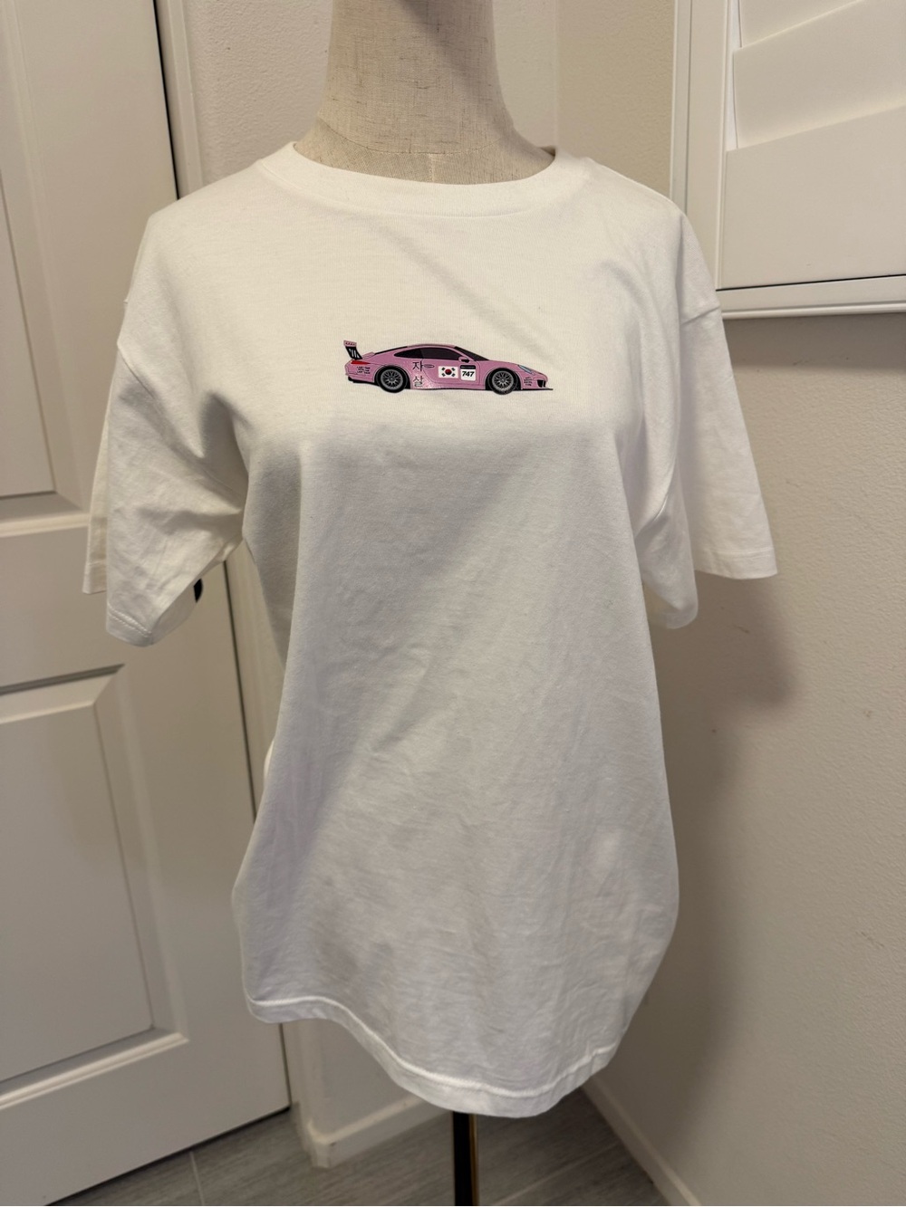 Anti Social Social Club White Tee with Pink Race Car Graphic